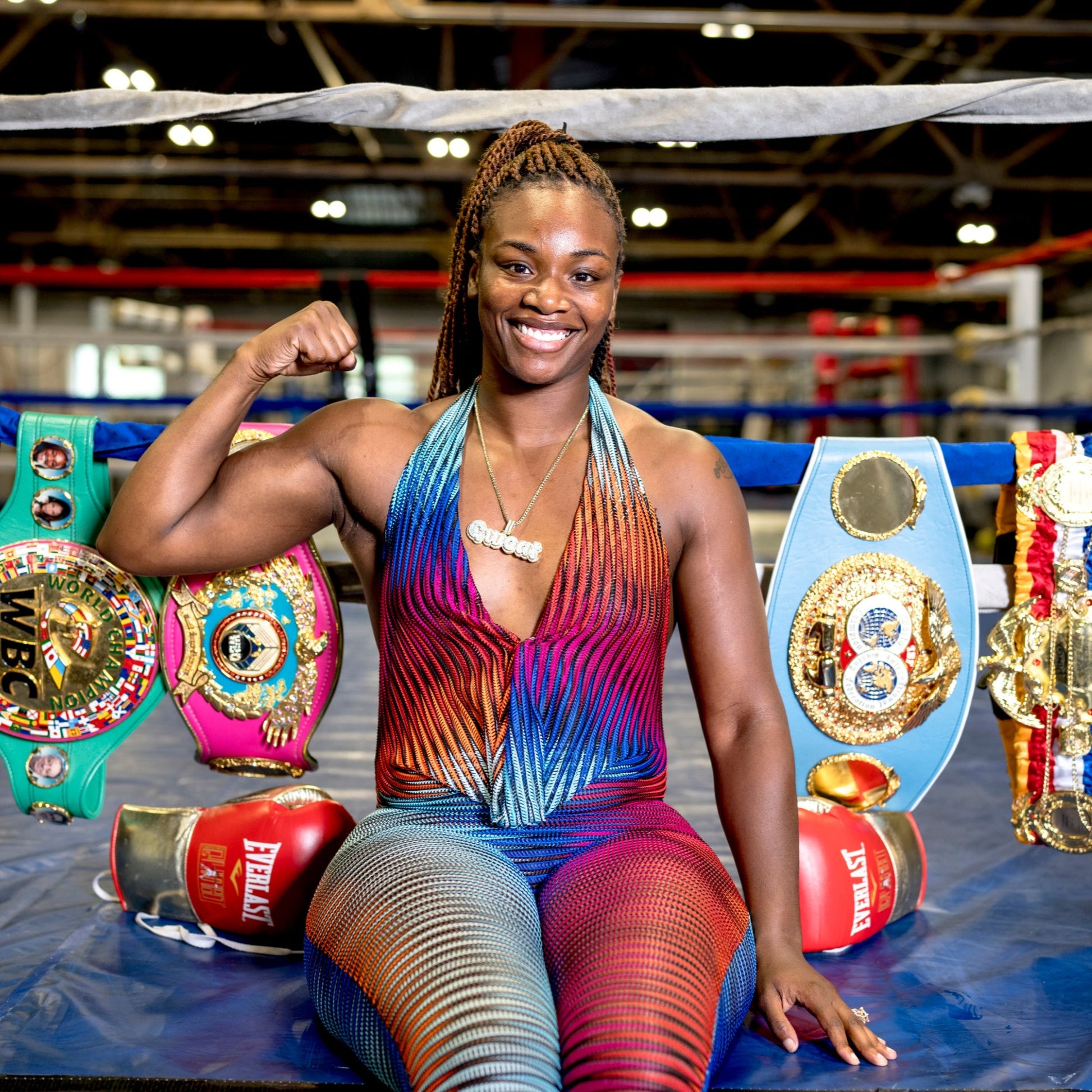 Claressa Shields poses with her belts