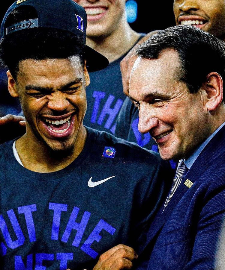 Mike Krzyzewski and Quinn Cook.